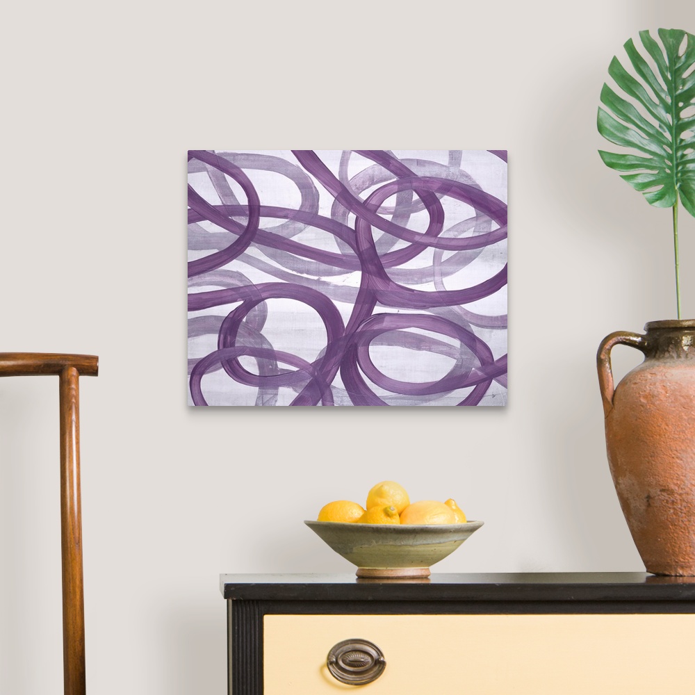 A traditional room featuring A compelling painting of free flowing curved lines in purple.