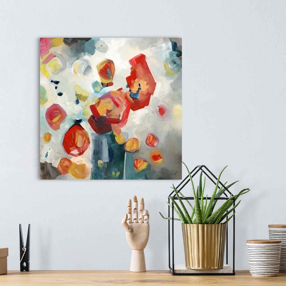 A bohemian room featuring Contemporary painting of a semi-abstract vase with red flowers.