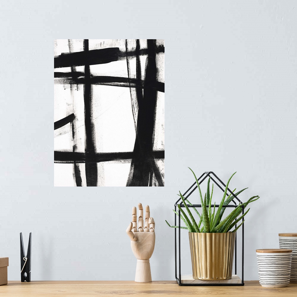 A bohemian room featuring Contemporary abstract painting using bold black lines against a white background.