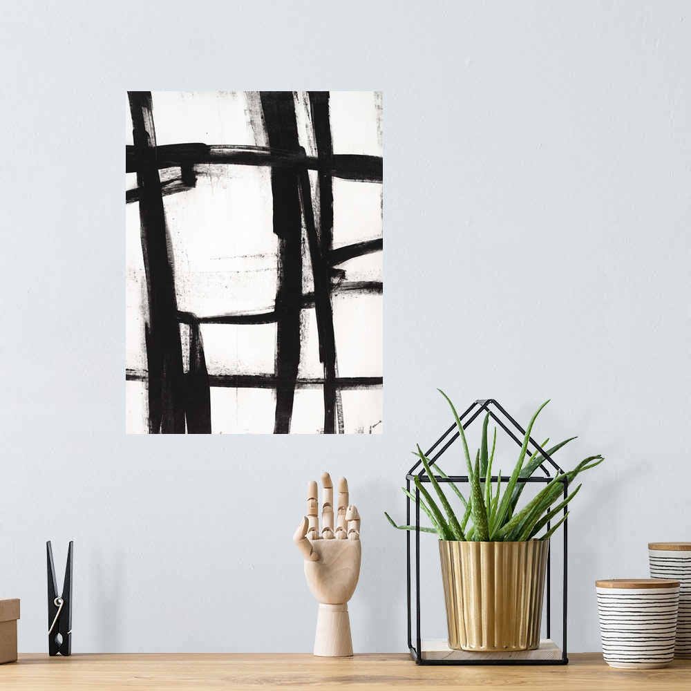 A bohemian room featuring Contemporary abstract painting using bold black lines against a white background.