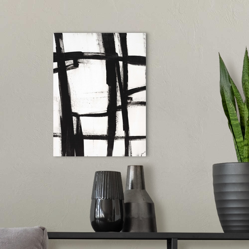 A modern room featuring Contemporary abstract painting using bold black lines against a white background.