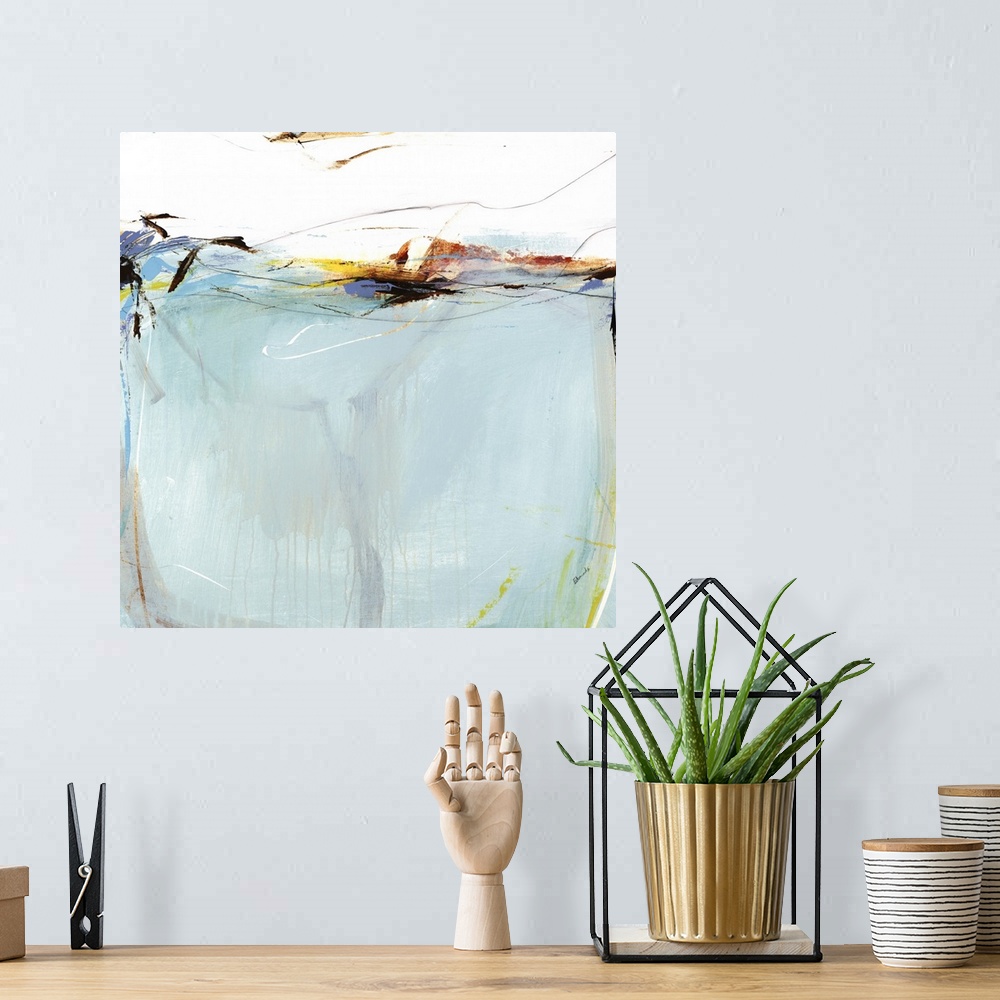 A bohemian room featuring Square abstract painting in light blue with a small area of white on the top and textured brush s...