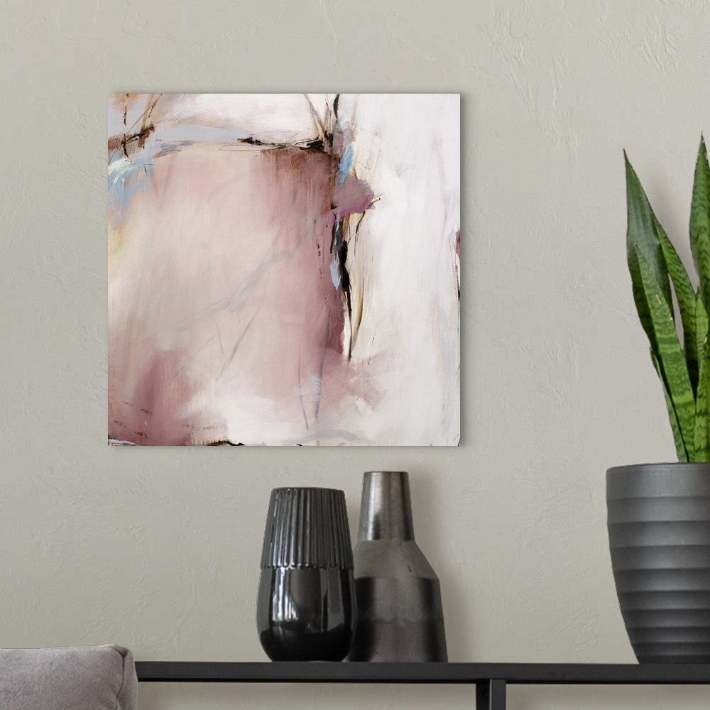 A modern room featuring Abstract painting of a square-like shape in pink with dark and light strokes outlining the shape.