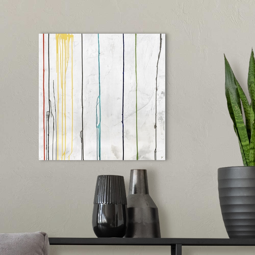 A modern room featuring Square abstract art with dripping lines of color in green, orange, yellow, dark blue, light blue,...