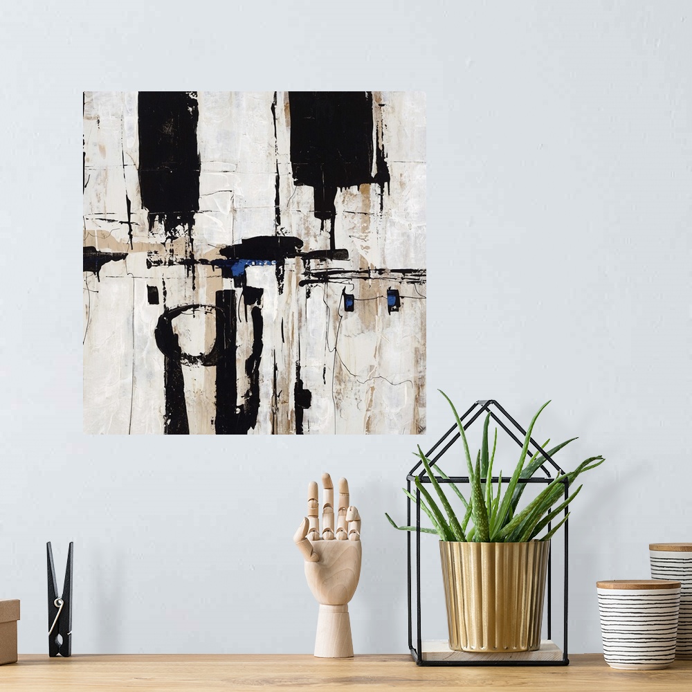 A bohemian room featuring Abstract painting of dark shapes and lines overlapping a light neutral background with areas of s...