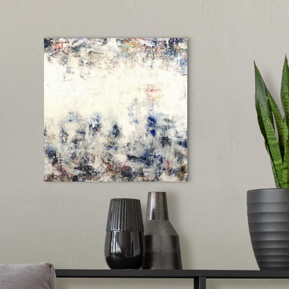 A modern room featuring Contemporary abstract painting using earth tones mixed with hints of blue.