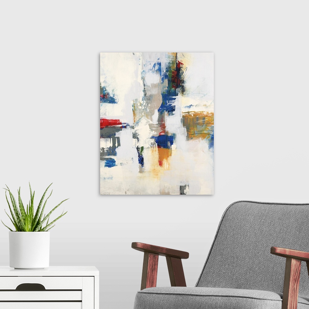 A modern room featuring Large abstract artwork with bright red, orange, blue, and green hues sectioned out and surrounded...