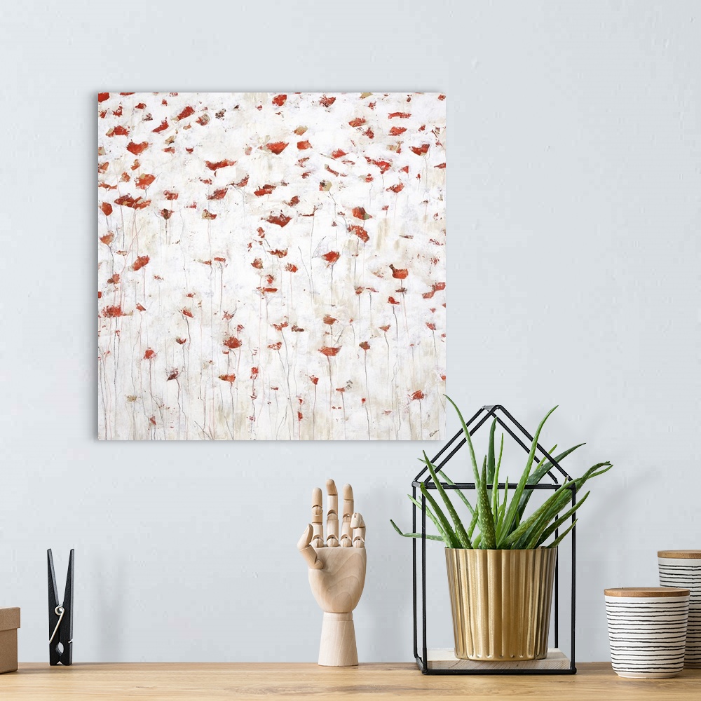 A bohemian room featuring Abstract painting using red dabs of paint with subtle lines coming down from them, giving the app...