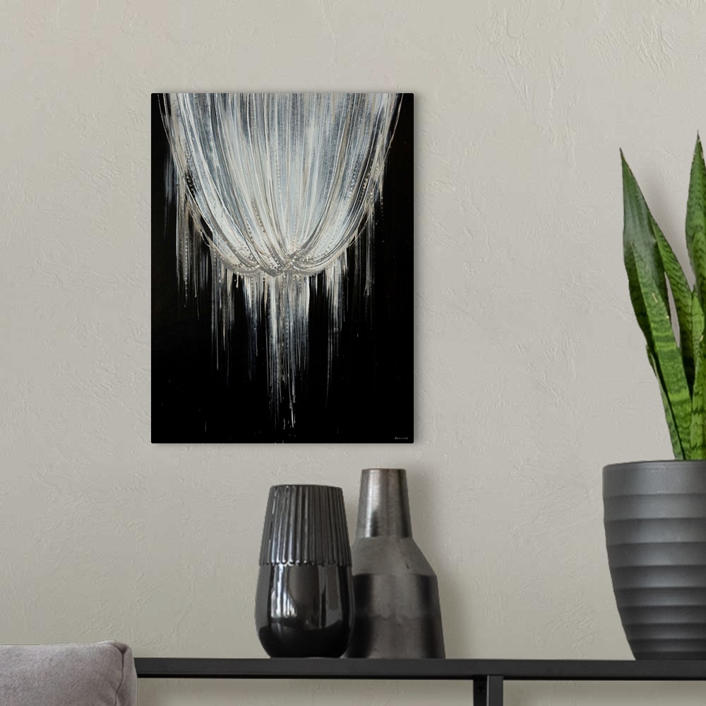 A modern room featuring Abstract contemporary artwork of beaded strands hanging over a black wall, giving the impression ...