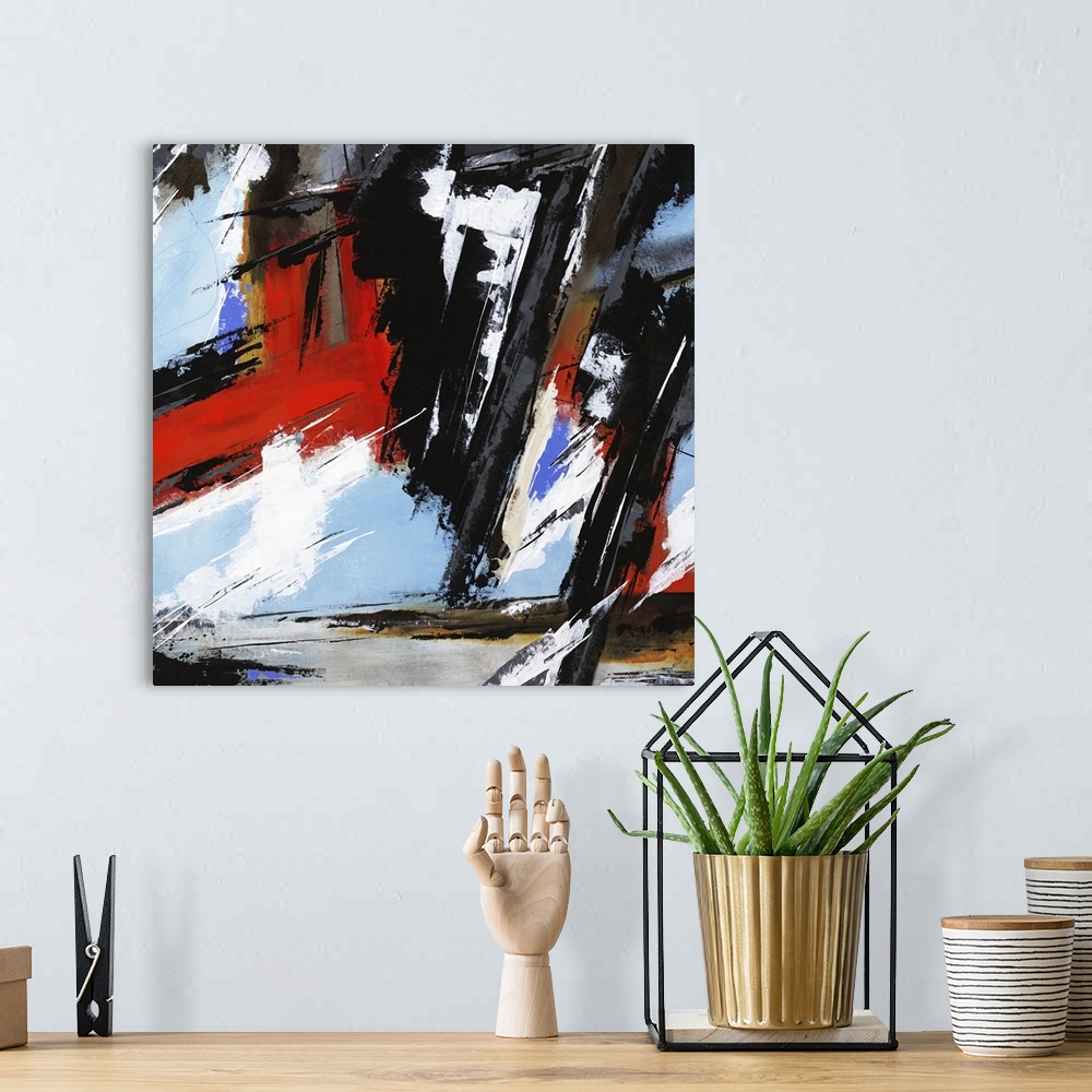 A bohemian room featuring Square abstract artwork with busy brushstrokes in bold black and red hues with lighter blue, gray...