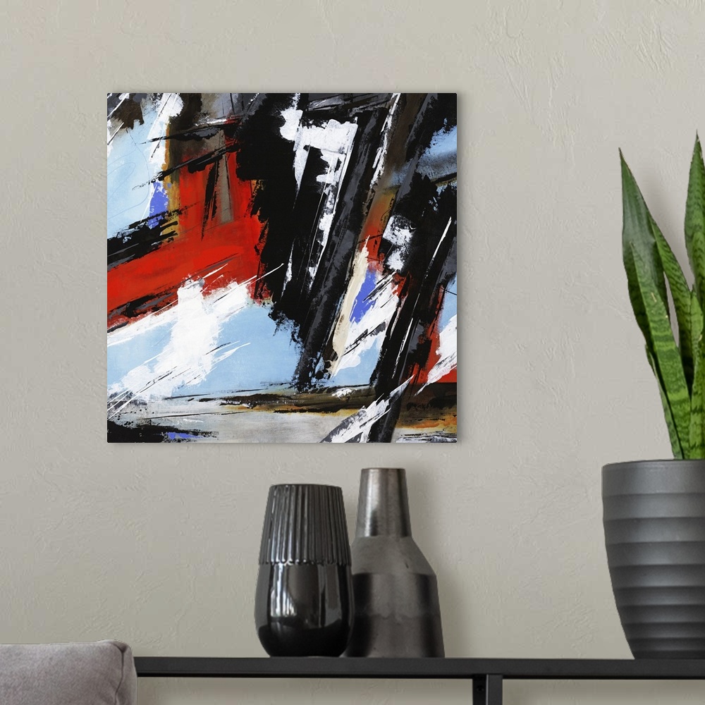 A modern room featuring Square abstract artwork with busy brushstrokes in bold black and red hues with lighter blue, gray...