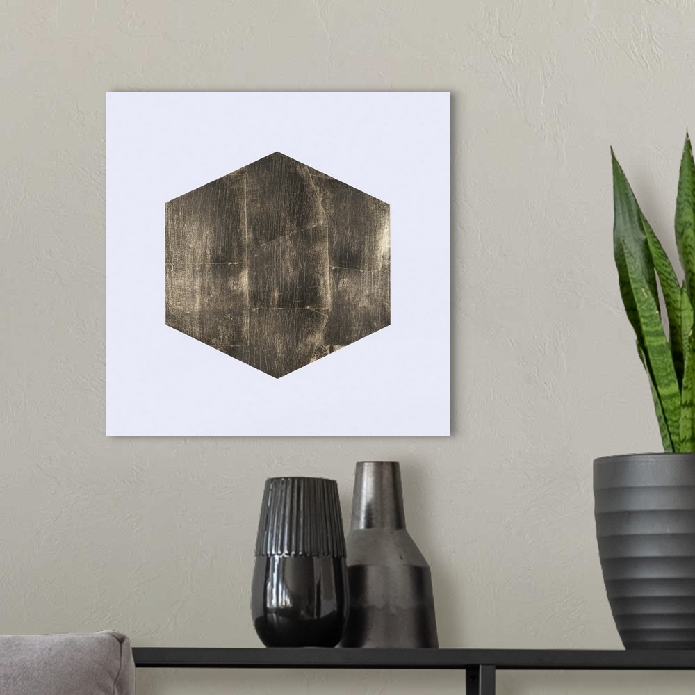 A modern room featuring Solid gold hexagon shape on a gray background.