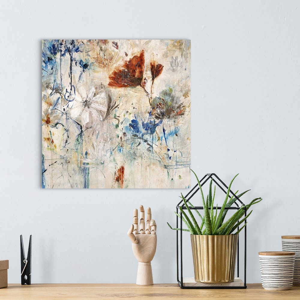 A bohemian room featuring Modern contemporary artwork of white, red, and blue flowers in full bloom.