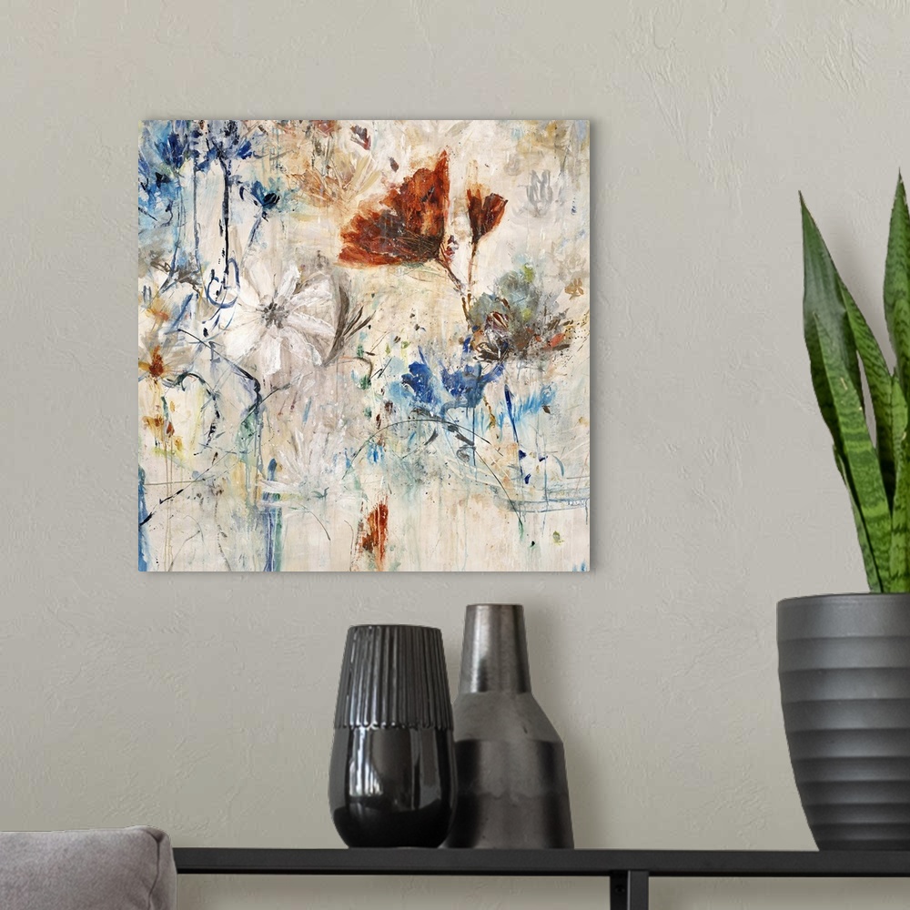 A modern room featuring Modern contemporary artwork of white, red, and blue flowers in full bloom.