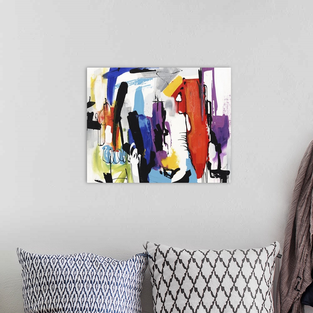 A bohemian room featuring Vibrant abstract painting filled with color and busy brushstrokes in all directions.