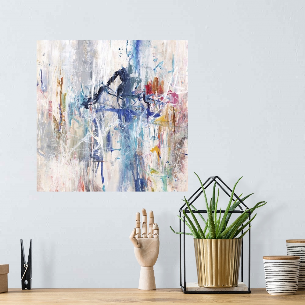 A bohemian room featuring A contemporary abstract painting using a spectrum of colors in an explosive arrangement.