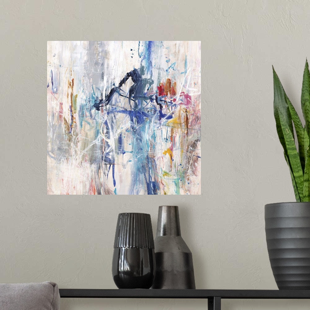 A modern room featuring A contemporary abstract painting using a spectrum of colors in an explosive arrangement.