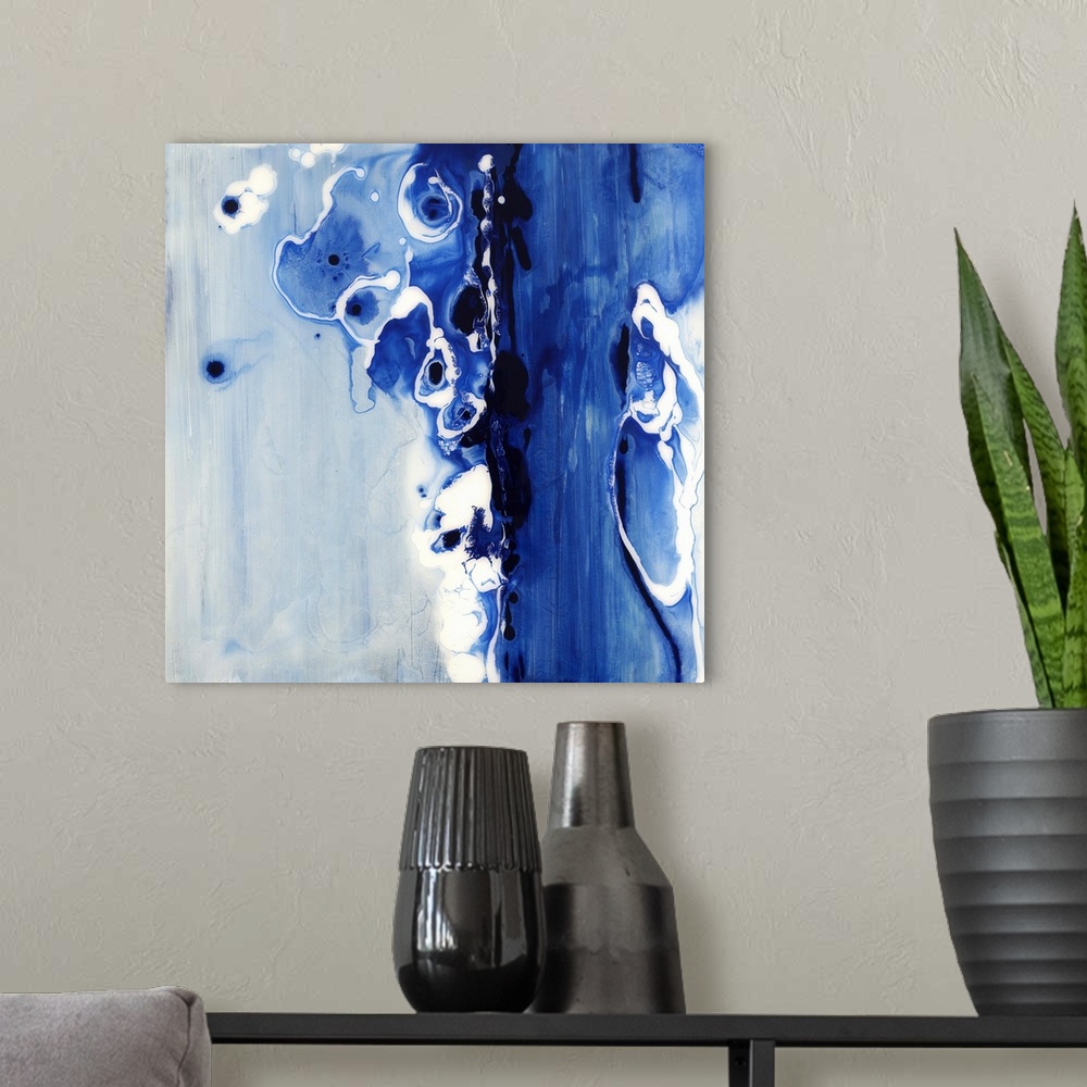 A modern room featuring Contemporary abstract painting of what looks like flowing dark blue liquid.