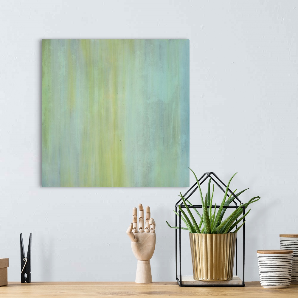 A bohemian room featuring Contemporary abstract painting of pale green tones mixed with aqua to create vertical lines.