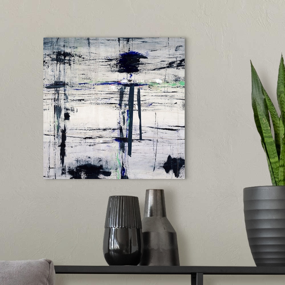 A modern room featuring Grungy contemporary abstract painting with dark, black, sporadic brushstrokes and pops of royal b...