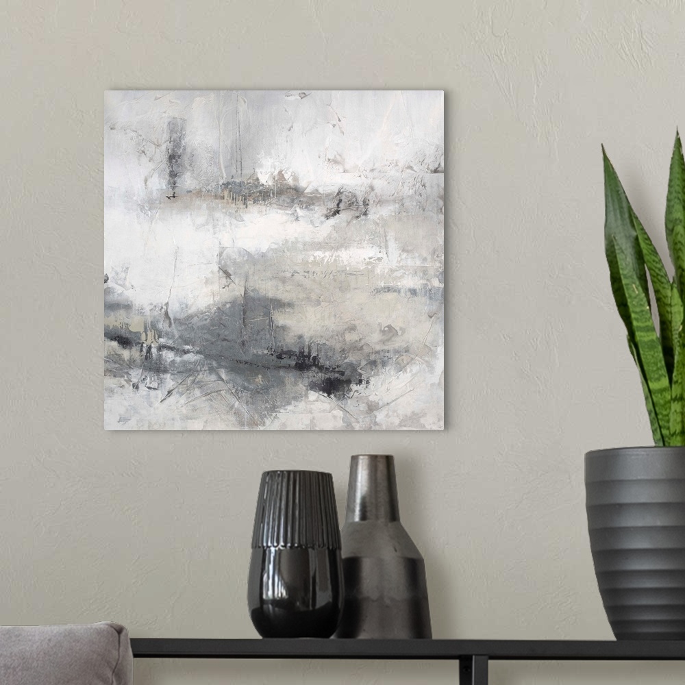A modern room featuring Abstract contemporary artwork in misty shades of white and grey.
