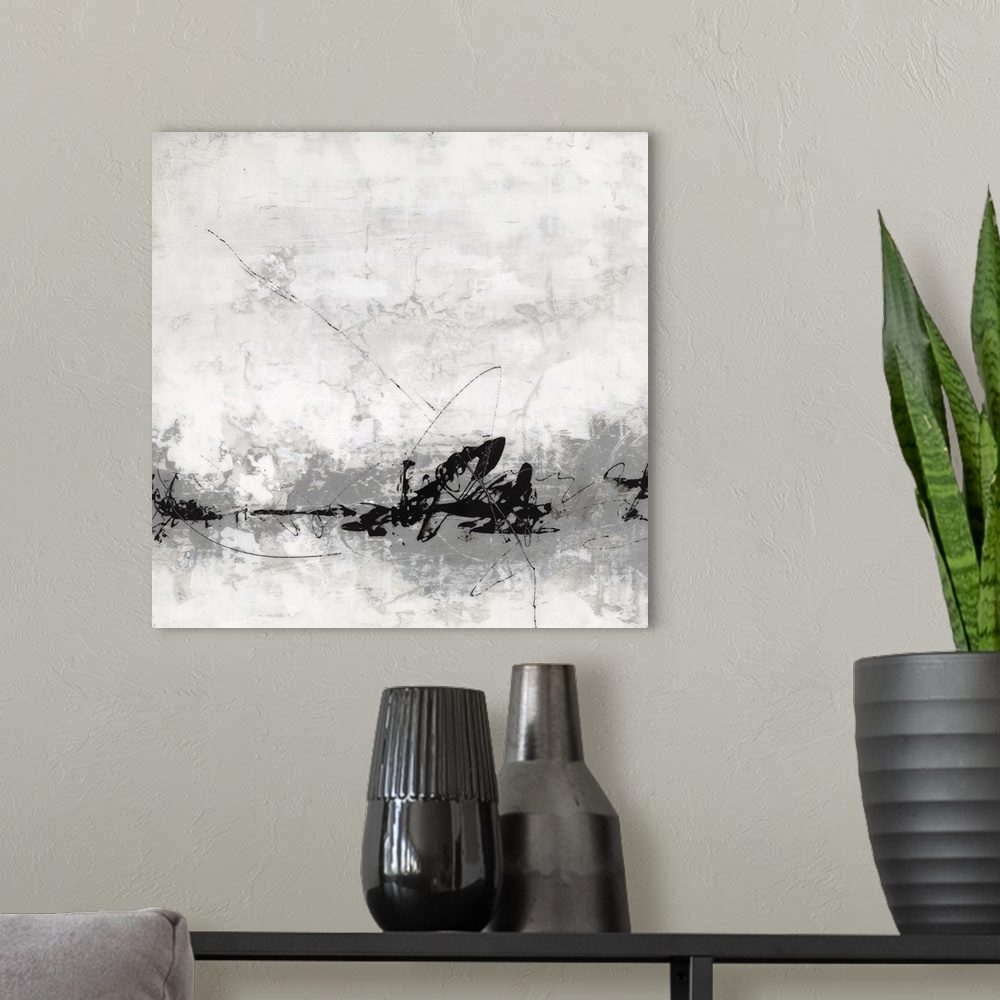 A modern room featuring Abstract art of thin swirling lines of black and grey paint on a roughly brushed light background.