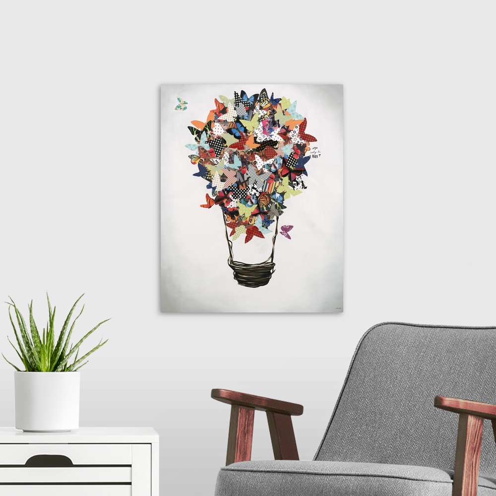 A modern room featuring Mixed media artwork with cut out butterflies in various colors and patterns creating the top of a...