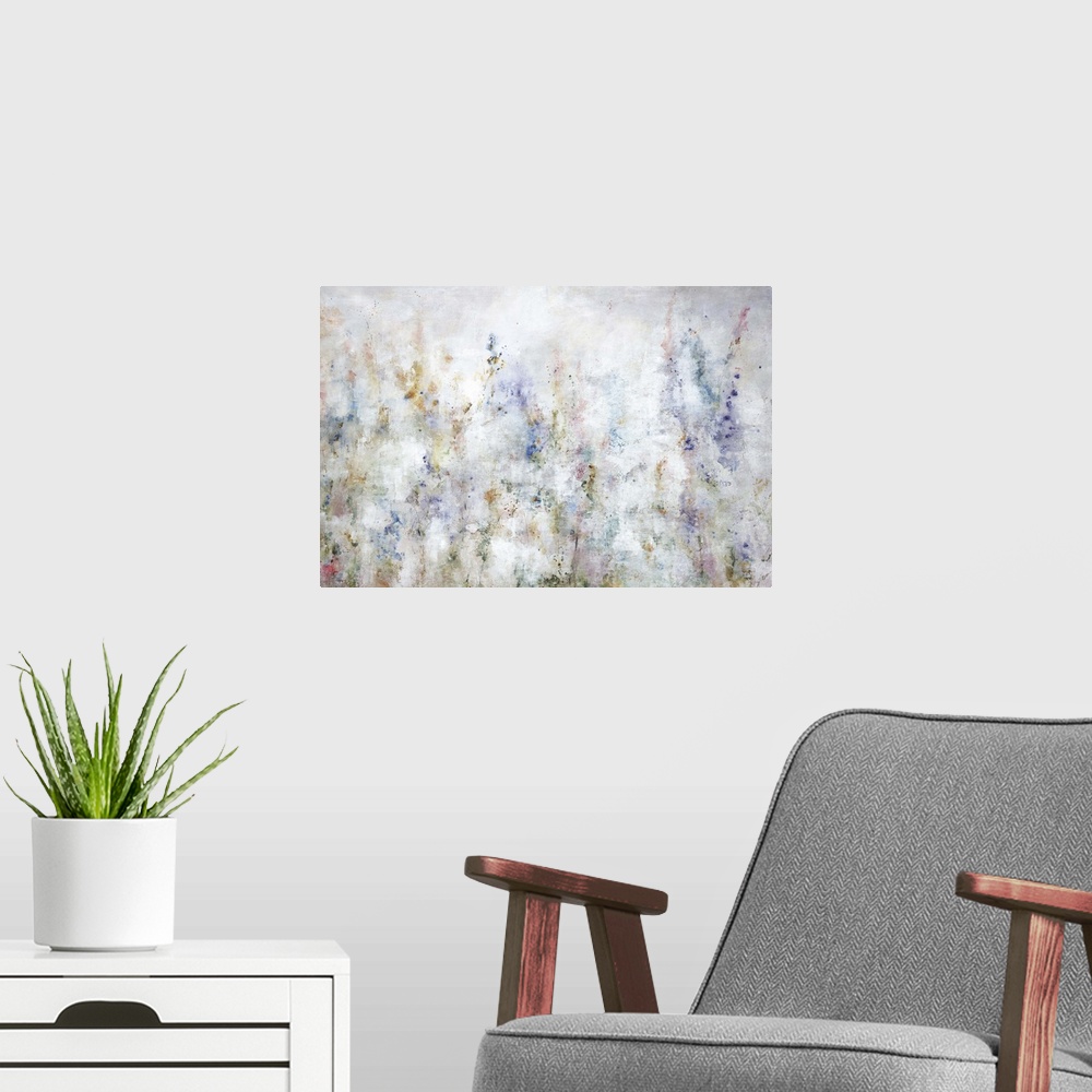 A modern room featuring An faded abstract landscape of a field of colorful wild flowers.