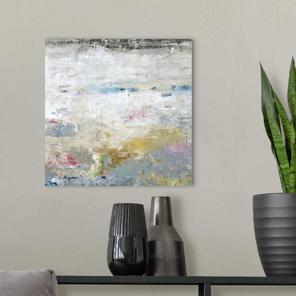 A modern room featuring Square abstract painting of textured  colors with accents of lighter colors of pink and yellow.