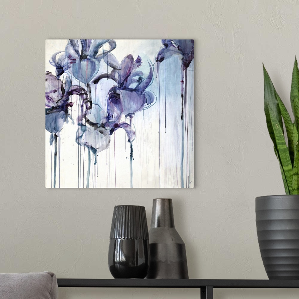 A modern room featuring Abstract floral painting of five iris blooms with drips of paint running down.