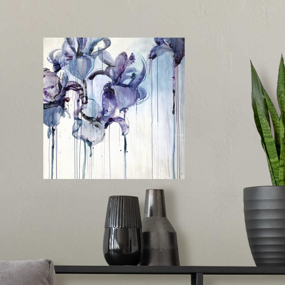 A modern room featuring Abstract floral painting of five iris blooms with drips of paint running down.