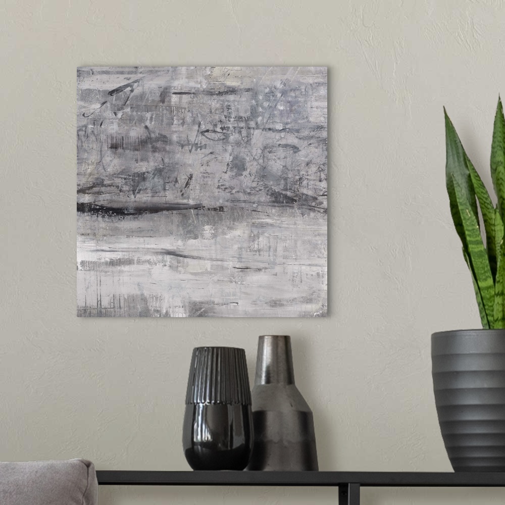 A modern room featuring Contemporary artwork in grey tones with a heavily weathered effect.
