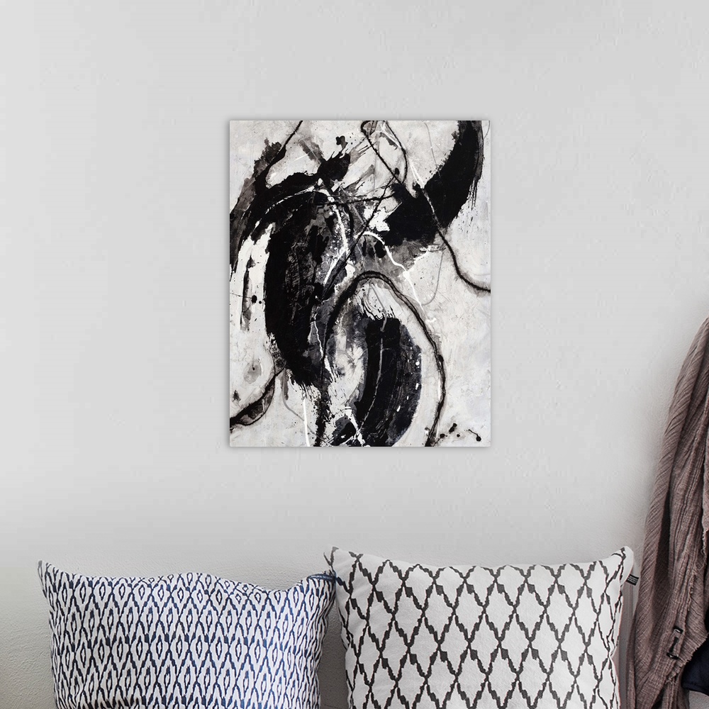 A bohemian room featuring Abstract painting of large, dark shapes and lines resembling a warrior riding an animal, on a lig...