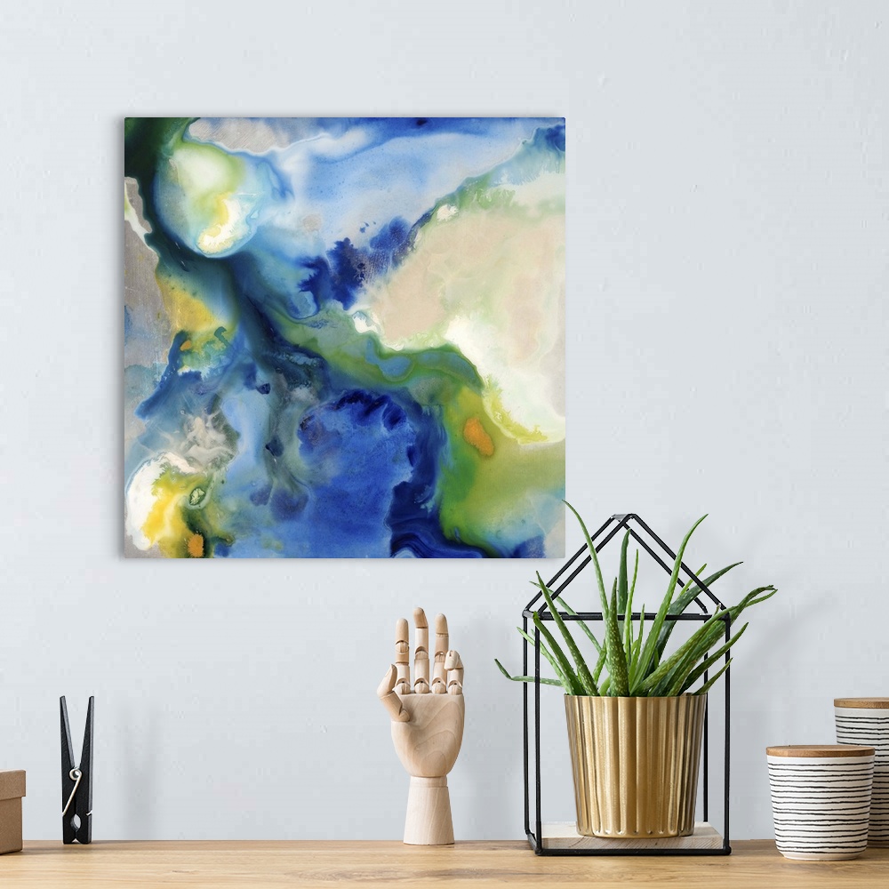 A bohemian room featuring Contemporary abstract painting of saturated blue and green tones in a swirling motion.