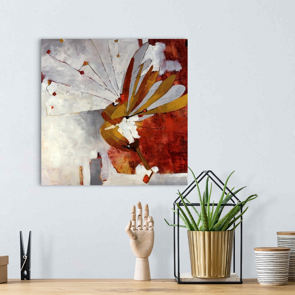 A bohemian room featuring Abstract art of a butterfly.