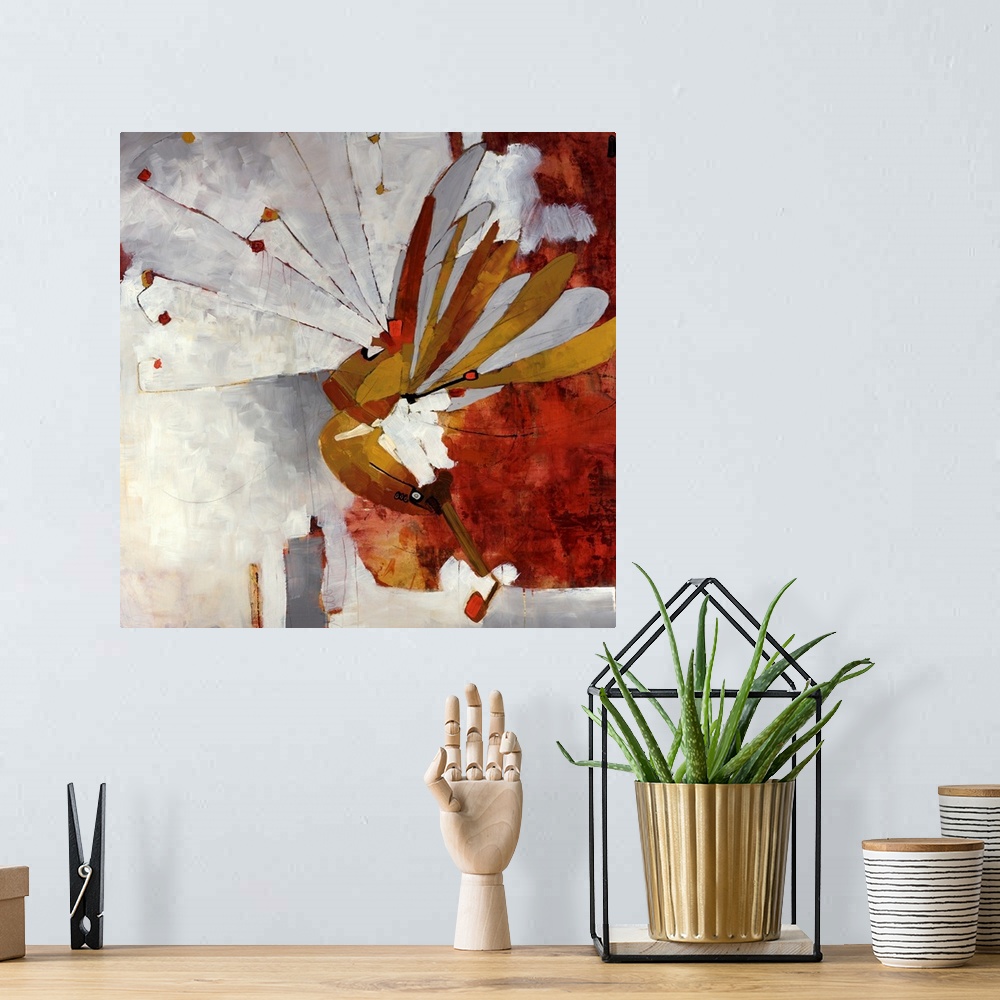 A bohemian room featuring Abstract art of a butterfly.