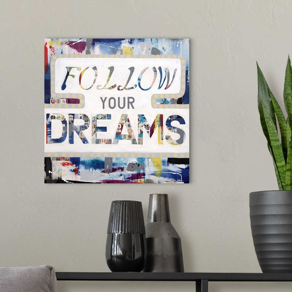 A modern room featuring The words "follow your dreams" made of a newsprint collage, outlined in white.