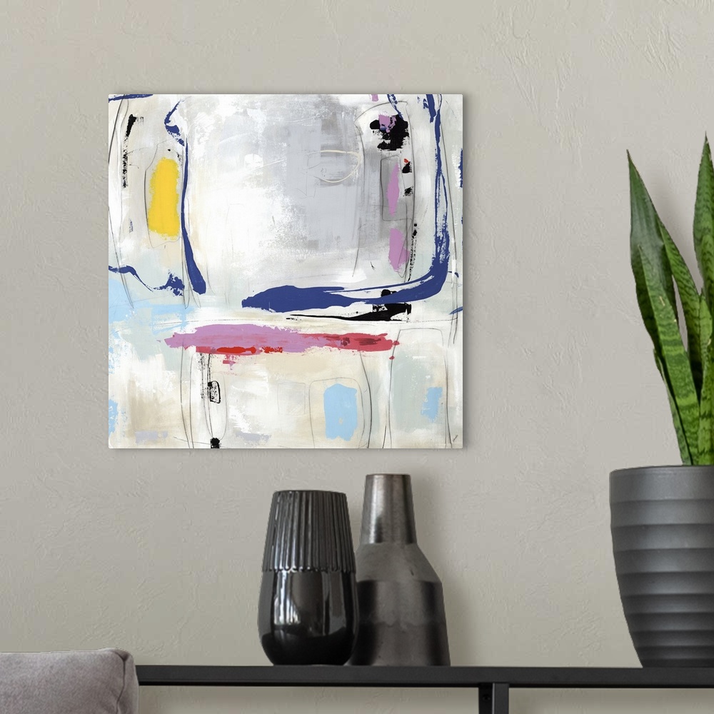 A modern room featuring Abstract painting of bold colorful brush  strokes on a gray and cream background.