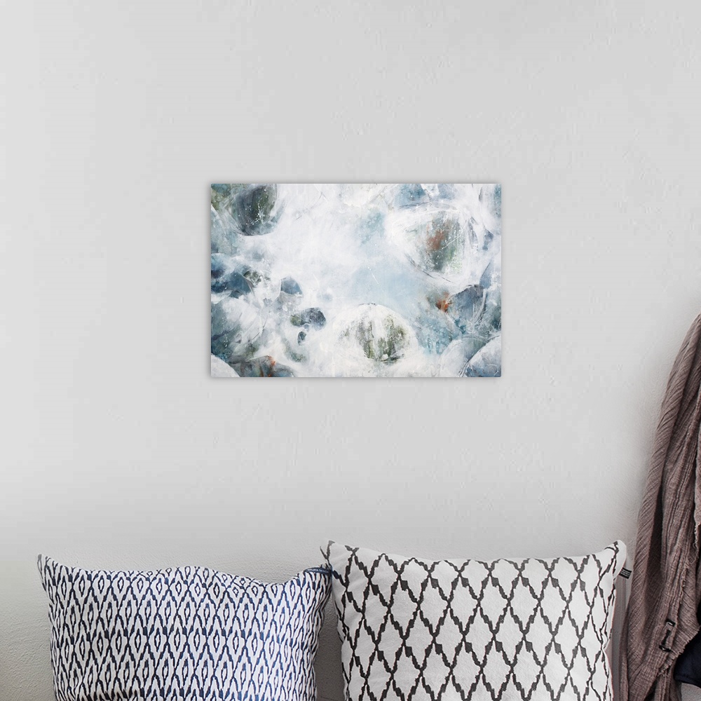 A bohemian room featuring Contemporary abstract painting of what looks like fluffy clouds in a pale blue sky.