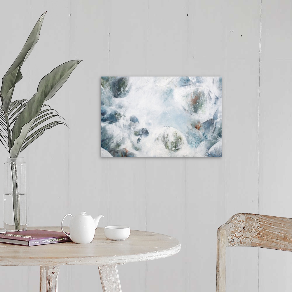 A farmhouse room featuring Contemporary abstract painting of what looks like fluffy clouds in a pale blue sky.
