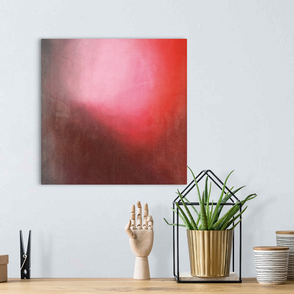 A bohemian room featuring Contemporary abstract painting using tones of red to create depth.