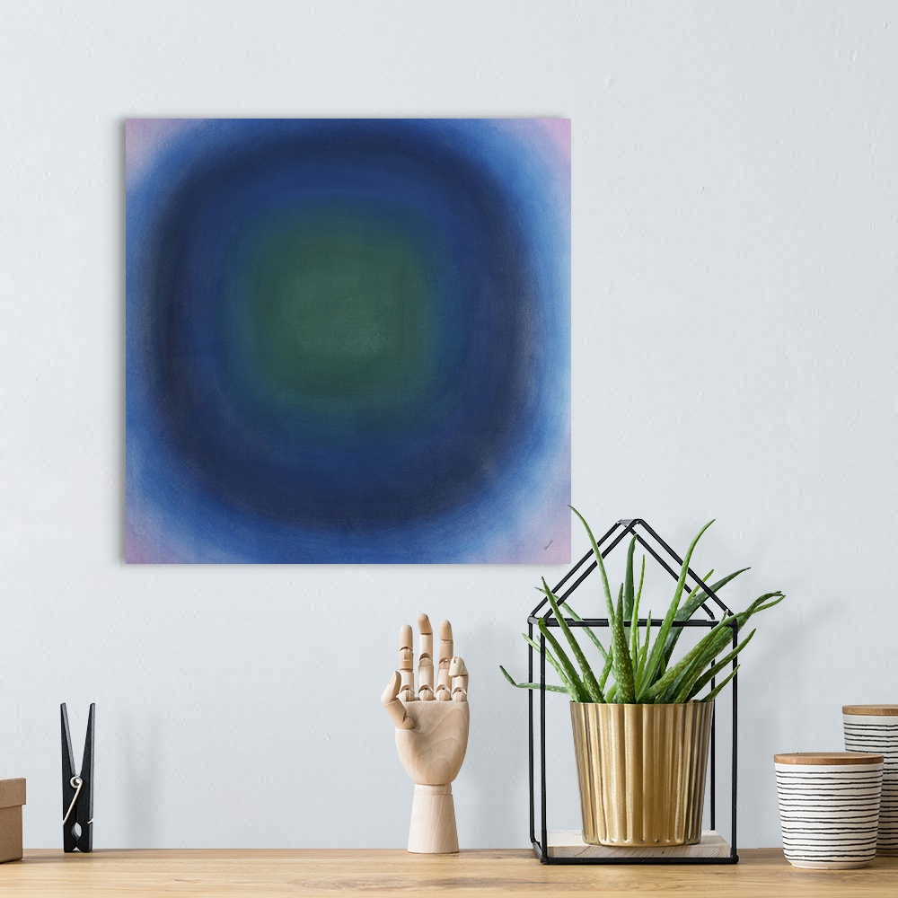 A bohemian room featuring Contemporary abstract painting of concentric circles in purple, green and blue.