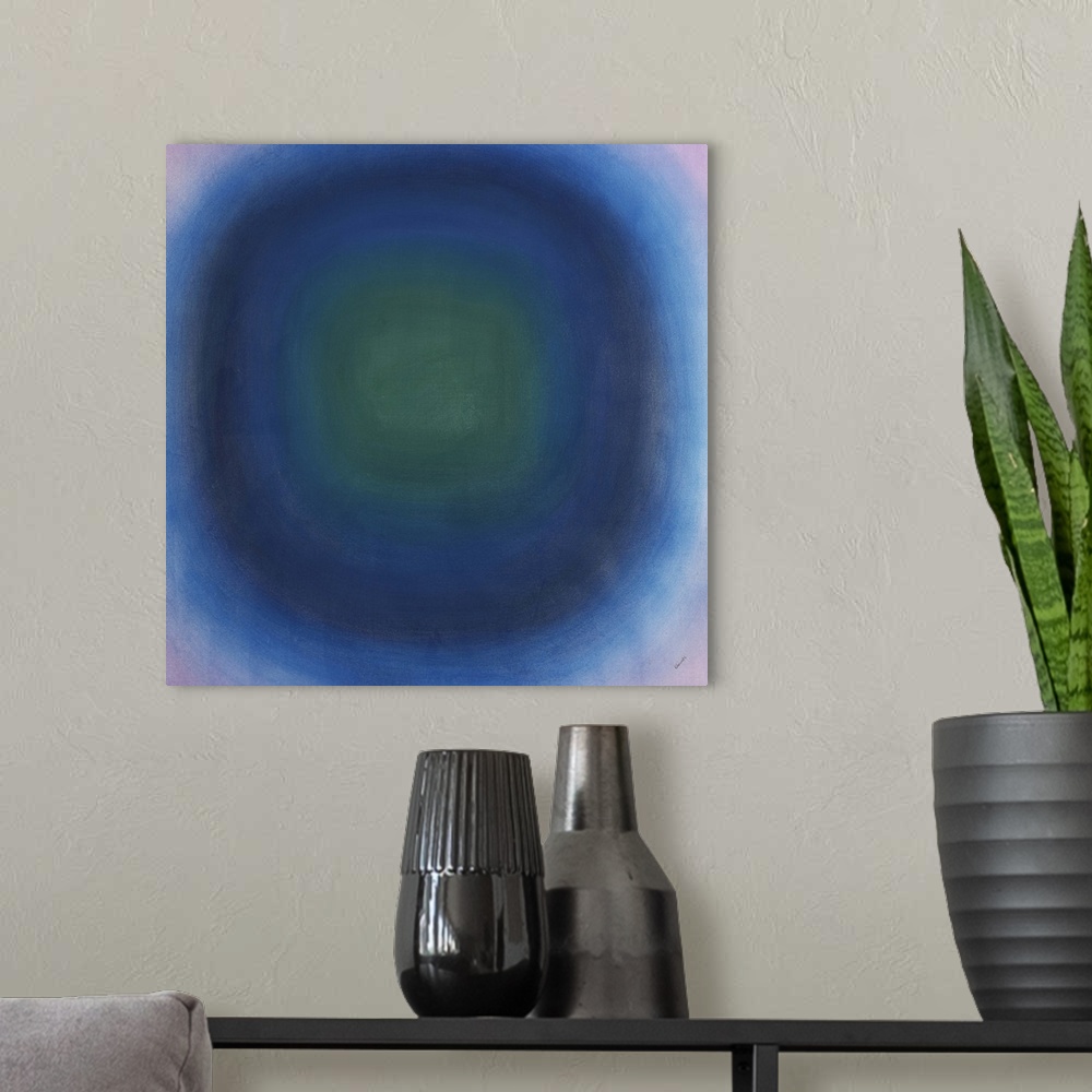 A modern room featuring Contemporary abstract painting of concentric circles in purple, green and blue.
