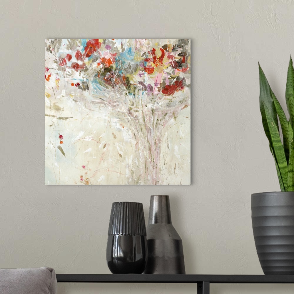 A modern room featuring Square painting of an abstract bouquet of colorful flowers on a neutral colored background.