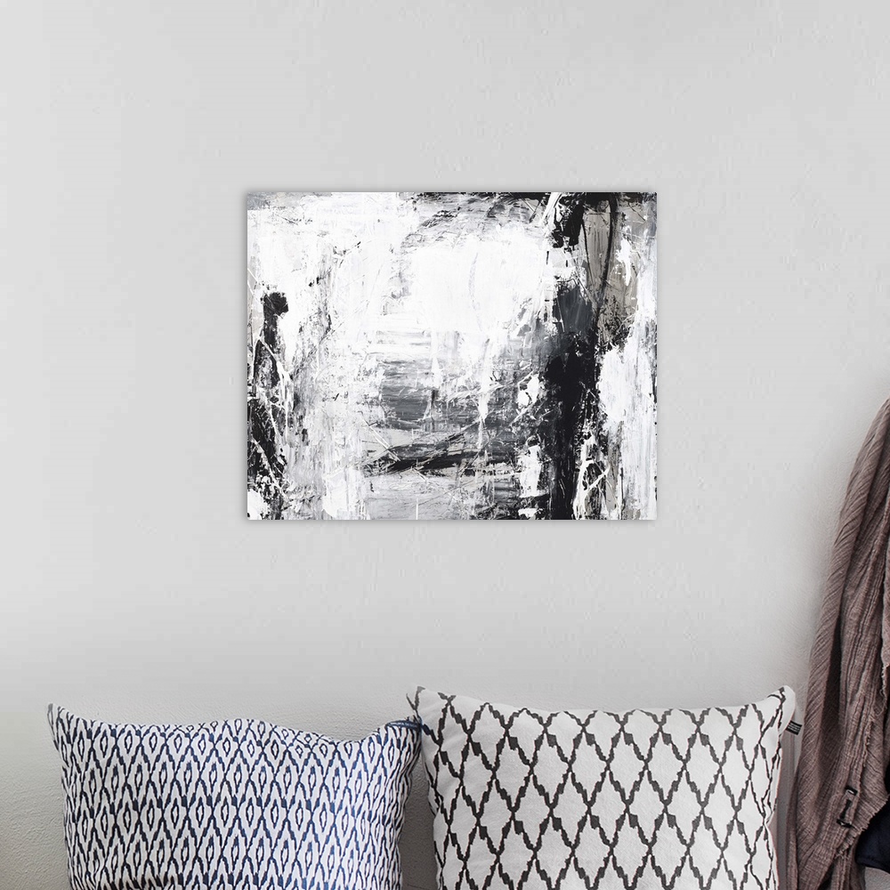 A bohemian room featuring Contemporary abstract painting using black and white.