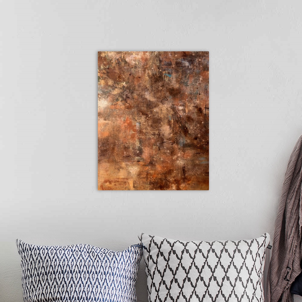 A bohemian room featuring Vertical, large abstract painting in varying earth tones that are randomly brushed together, with...