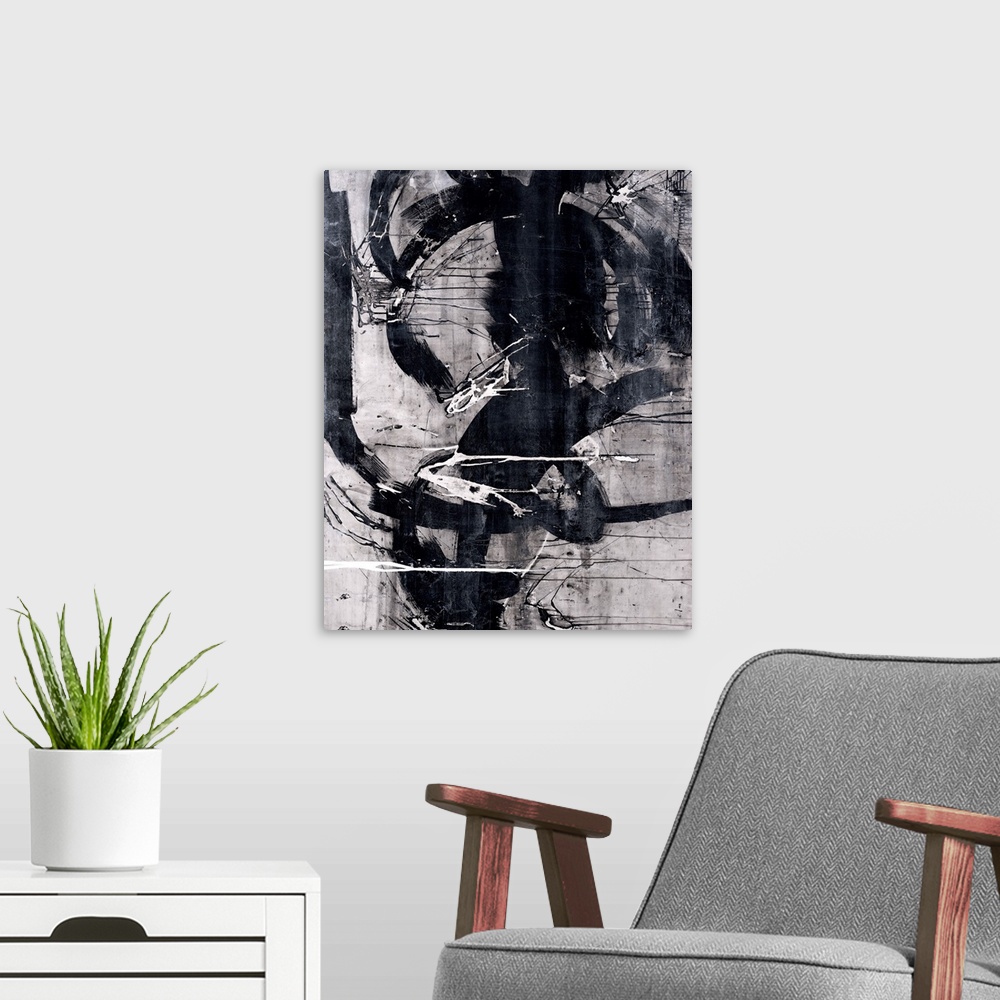 A modern room featuring Abstract painting that has black, white, and gray hues with thick, bold, black curvy lines domina...