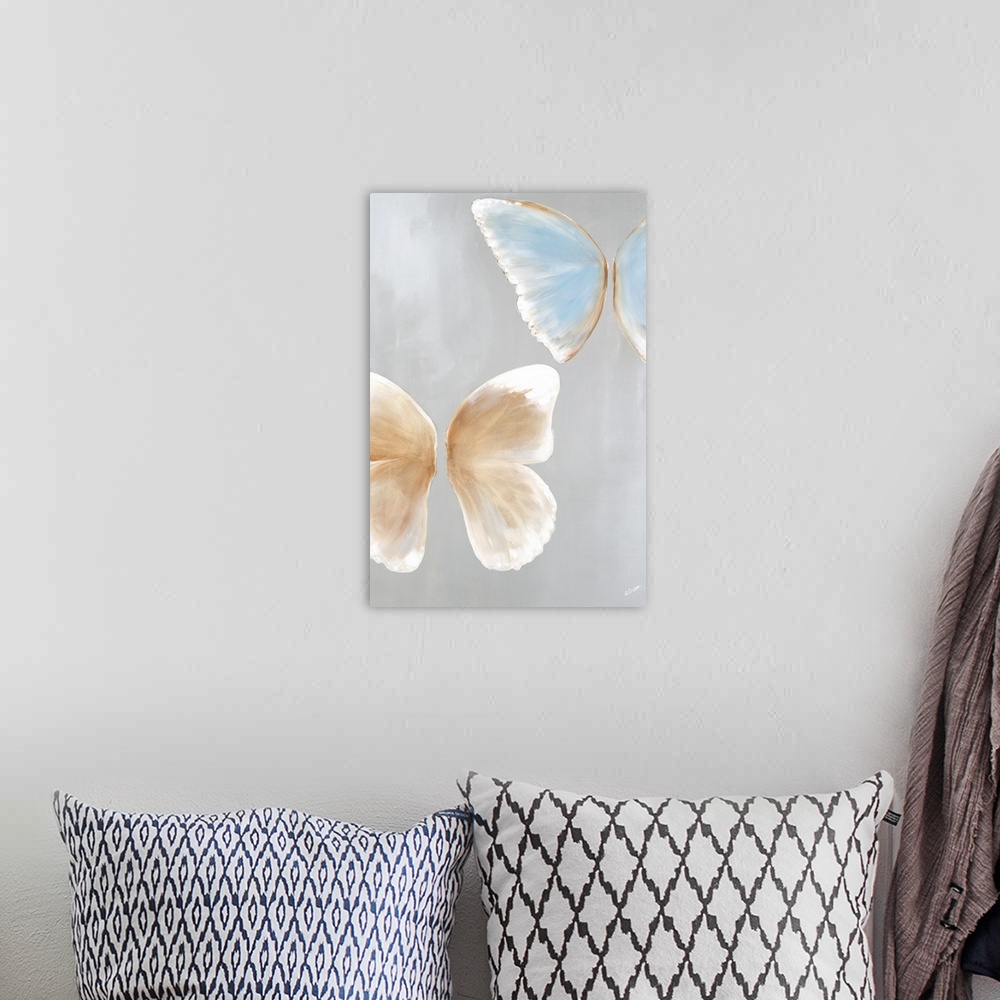 A bohemian room featuring Contemporary abstract painting of pale colored butterflies against a gray background.