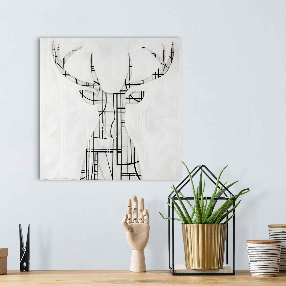 A bohemian room featuring Modern art of a silhouette of a buck with large antlers, his shape composed of contrasting geomet...