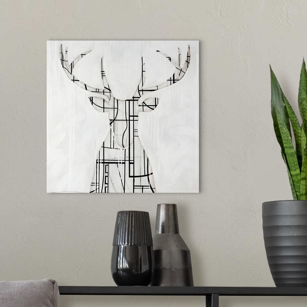 A modern room featuring Modern art of a silhouette of a buck with large antlers, his shape composed of contrasting geomet...